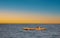 Malagasy fisherman on wooden old pirogue