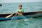 Malagasy fisherman on wooden old pirogue