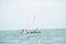 Malagasy fisherman on wooden old pirogue