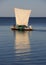 Malagasy fishermen and their outrigger canoes