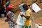 Malagasy woman sell corn on street