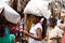 Malagasy woman transport cargo on head