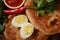 Malawach with hard boiled eggs and tomatoes.  Malawach or malawah: traditional fried bread of Yemenite Jews