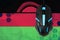 Malawi flag and computer mouse. Concept of country representing e-sports team