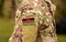 Malawi flag on soldiers arm collage