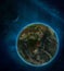 Malawi from space on Earth at night surrounded by space with Moon and Milky Way. Detailed planet with city lights and clouds. 3D