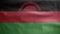 Malawian flag waving in the wind. Close up of Malawi banner blowing soft silk