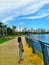 A Malay girl standing at the lake, looking at the cloudy skies at Precint 8, Putrajaya Malaysia