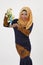 Malay woman showing ketupat
