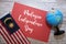 \\\'Malaysia Independence Day\\\' wording flat lay concept