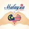 Malaysia National Day - Two hands making heart shape gesture with Malaysia flag.