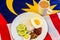Malaysian Breakfast - Nasi Lemak and Teh Tarik on Malaysia Flag.