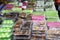 Malaysian cakes are on display for sale on the table.