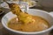 Malaysian chicken satay dip into delicious peanut sauce, one of