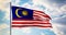 Malaysian flag waving in the wind shows malaysia symbol of patriotism - 4k 3d render