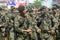 Malaysian soldiers in uniform and fully armed.