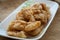 Malaysian style battered and deep fried dory fish cubes.