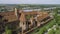 Malbork a powerful Teutonic castle over the Nogat from a bird`s eye view