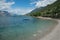 MALCESINE, ITALY - AUGUST 30, 2023: VIew of beautiful beach of Malcesine on Garda lake