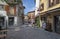 MALCESINE, ITALY - JUNE 13, 2019: The little square of the old town on the waterfront of Lago di Garda lake