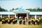 Malda, India- February 2nd, 2019: Children praying the national anthem before school starts in uniform in front of school building