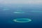 Maldives aerial panorama blue water reef