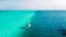 Maldives atoll island Aerial view sail boat cruising