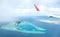 Maldives island atoll, vacation paradise sea, aerial view