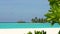 Maldives island. Natural tropical Sea Beach landscape. Crystal clear sea wave and white sand beach. Relax on clean sunny