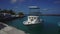Maldives island. View of marina and docked recreational boat. Paradise place.