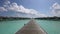 Maldives paradise island. Luxury overwater villas on blue lagoon, white sandy beach and Otemanu mountain at Bora Bora