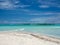 Maldives tropical islands panoramic scene, idyllic beach palm tree vegetation and clear water Indian ocean sea, tourist resort