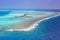 Maldives vacation paradise sea island atoll lagoon aerial photo