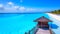 Maldives. View of the white sandy beach from the terrace of the water villa