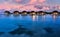 Maldivian water bungalows at dusk