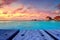 Maldivian water bungalows at dusk