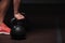 Male adult exercising with kettle bell in gym