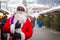 Male African-American dressed as Santa Claus at the Christmas fair