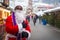 Male African-American dressed as Santa Claus at the Christmas fair