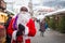 Male African-American dressed as Santa Claus at the Christmas fair