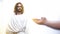 Male asking God for blessing and forgiveness, Jesus standing in holy light