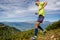 male athlete running down steep mountainside in Rosa Wild Trail