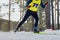 male athlete skier running cross country skiing