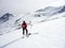 Male backcountry skier studies a map on a high alpine glacier in the Austrian Alps