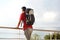 Male backpacker looking at the sea