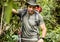 Male backpacker trekking in the forest