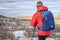 male backpacker in winter landscape of Colorado foothills - Horsetooth Mountain Open Space