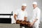 Male Baker\'s Packing Bread Loaves In Bakery