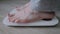Male bare feet stepping on digital floor scales - man weighing himself