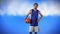 Male basketball player against clouds in the sky